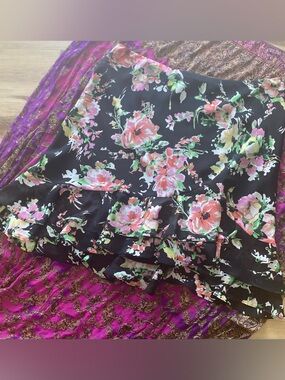 Chaps black with floral print skirt